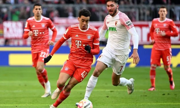 Drama di Augsburg: Bayern Menang Tipis, Kolaborasi Fashion Mengejutkan, dan Transfer Besar yang Mengguncang Bundesliga